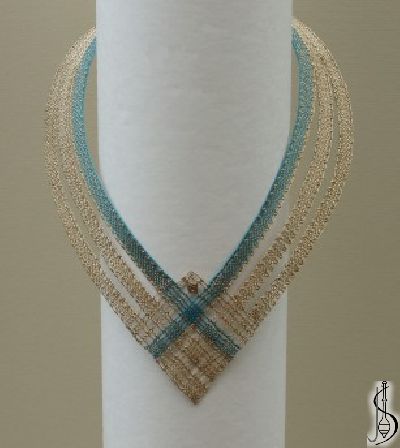 Necklace No. 10292c 
		   Blue and beige silk, golden metallic yarn.
Price: 
............................
 Protected by copyright! 



 

