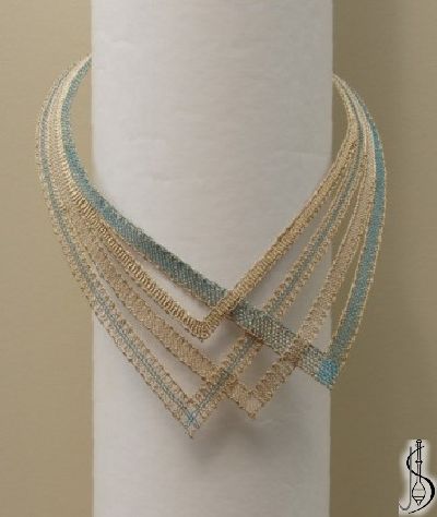 Necklace No. 10443c 
		   Blue and beige silk, golden metallic yarn.
............................
 Protected by copyright! 


